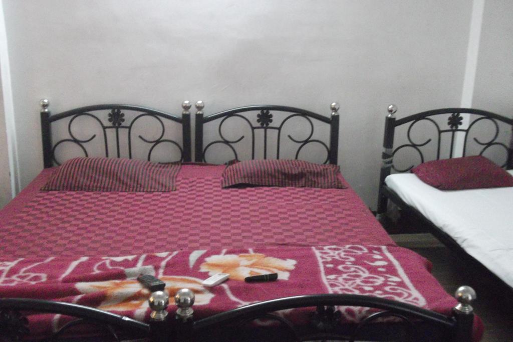 Megacity Inn Calcutta Værelse billede
