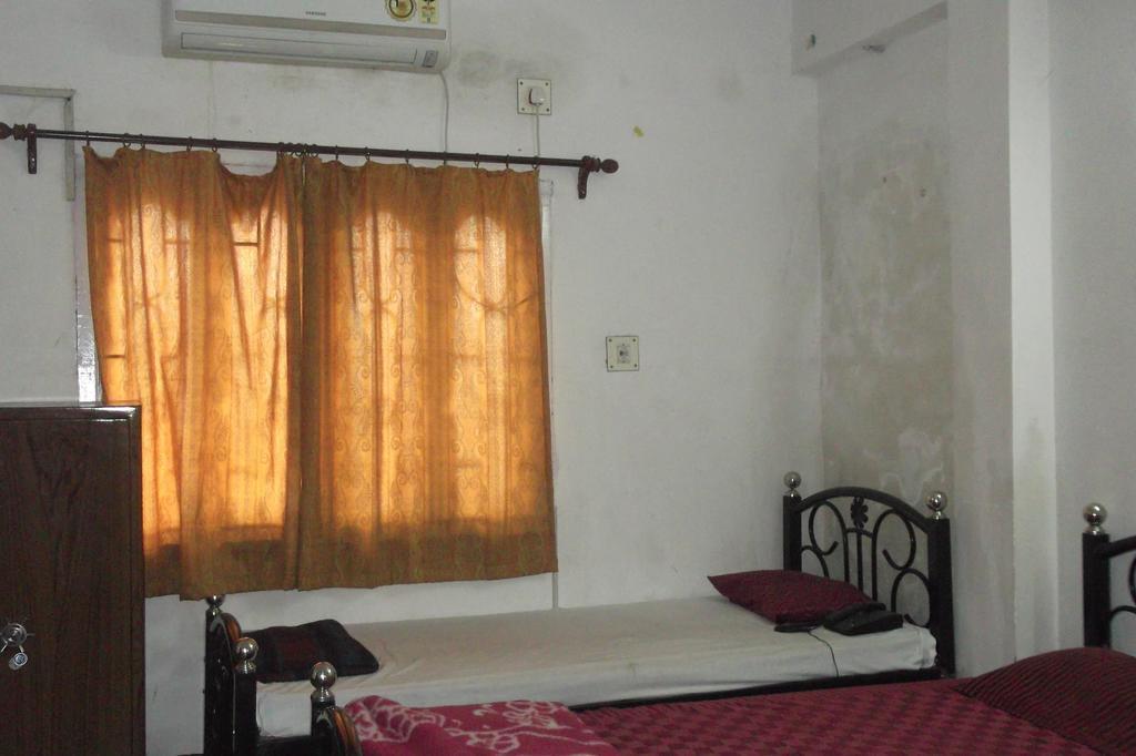 Megacity Inn Calcutta Værelse billede